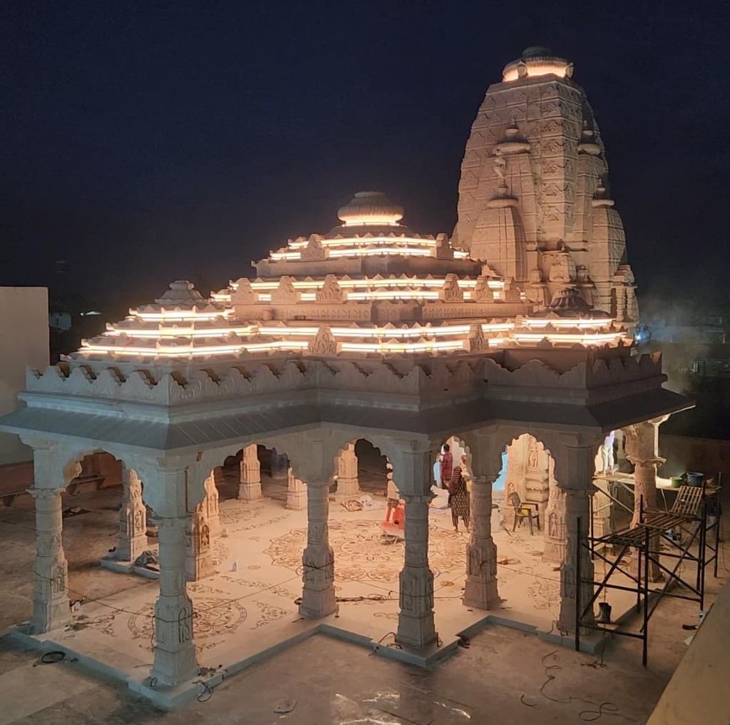 Shri Ramji Mandir temple at night - Contact Us
